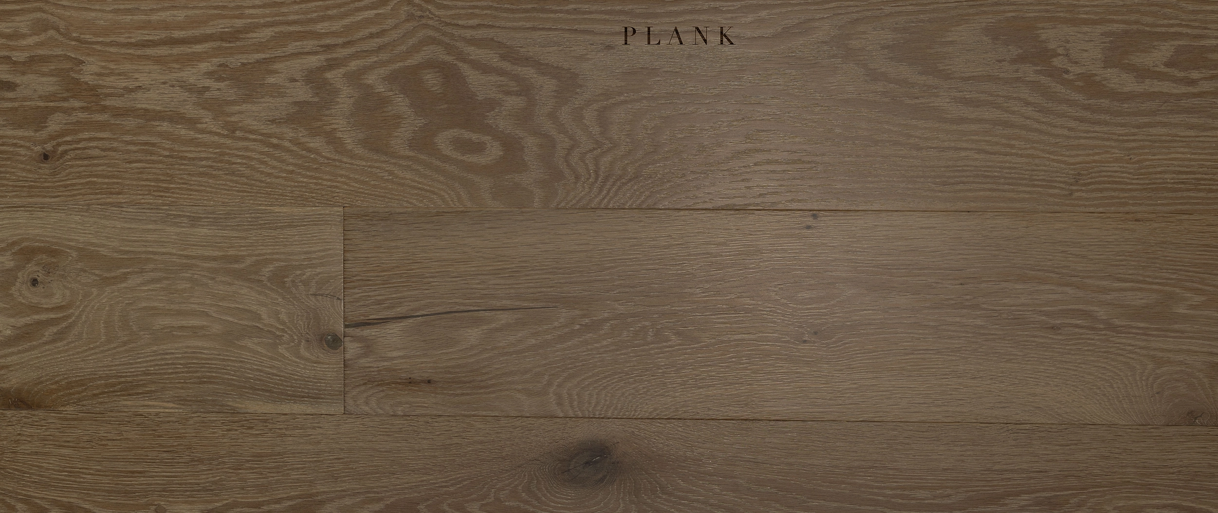 Dark ash colored hardwood flooring and cladding in Irvine. Wood flooring types Oxnard, Port Hueneme, and Ventura County. Plank Hardwoods cladding decking and solid hardwood sales for home improvement.